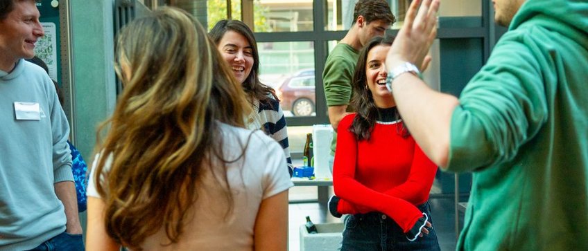 Postdoctoral Researchers Scientific conversations during a poster session at the max planck institute of biophysics.